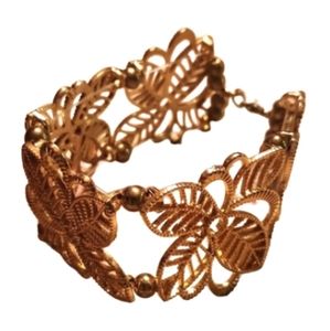 Goldtoned filigree floral Vintage Cuff nwot